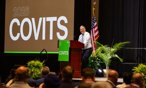 Mike Watson presenting at COVITS 2026
